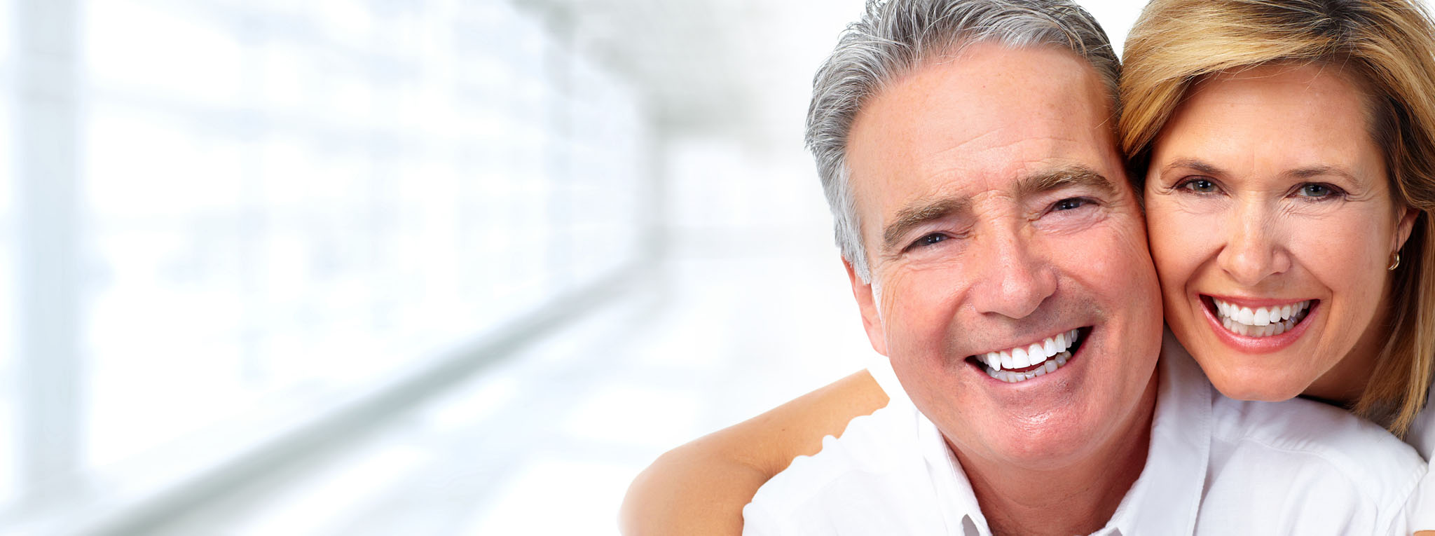 Beautiful wide smile of young fresh woman with great healthy white teeth. Isolated over background